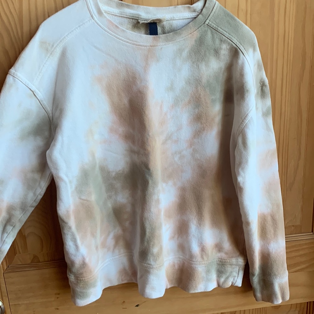 sage green, cream, and white tie dye shirt.